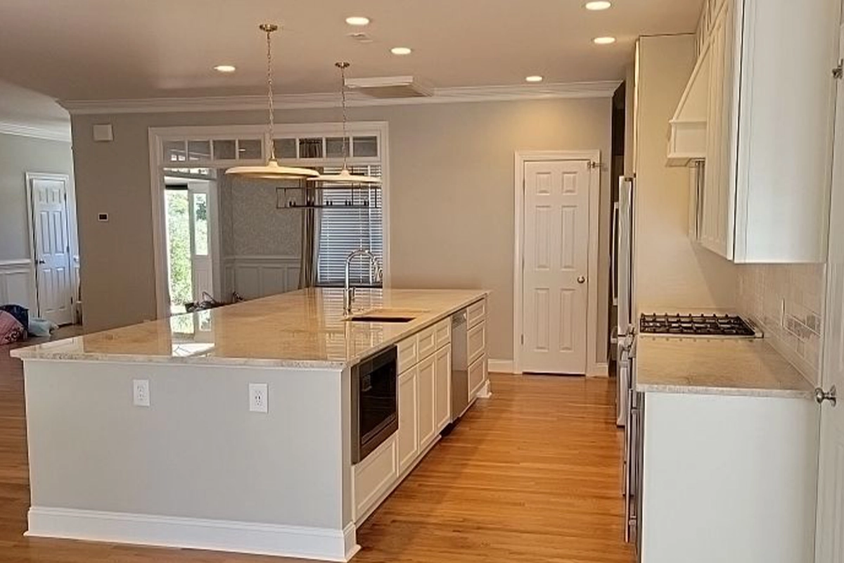 http://toppriorityconstruction.com/wp-content/uploads/2023/11/Top-Priority-Kitchen-Remodel-1.webp